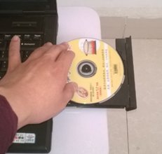 如何把这个光盘的内容复制到电脑上，然后在电脑上播放